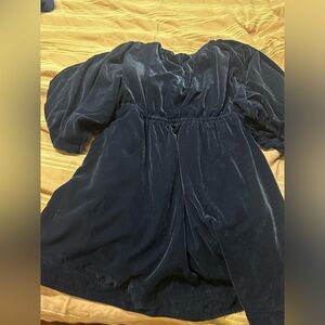 Like new without tags. Navy blue velvet mini. Size medium runs large. Worn once